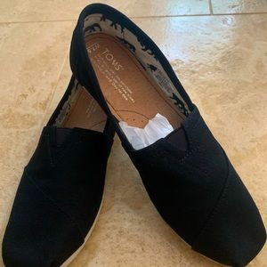 Never worn Toms Alpargata canvas shoes. 7.5